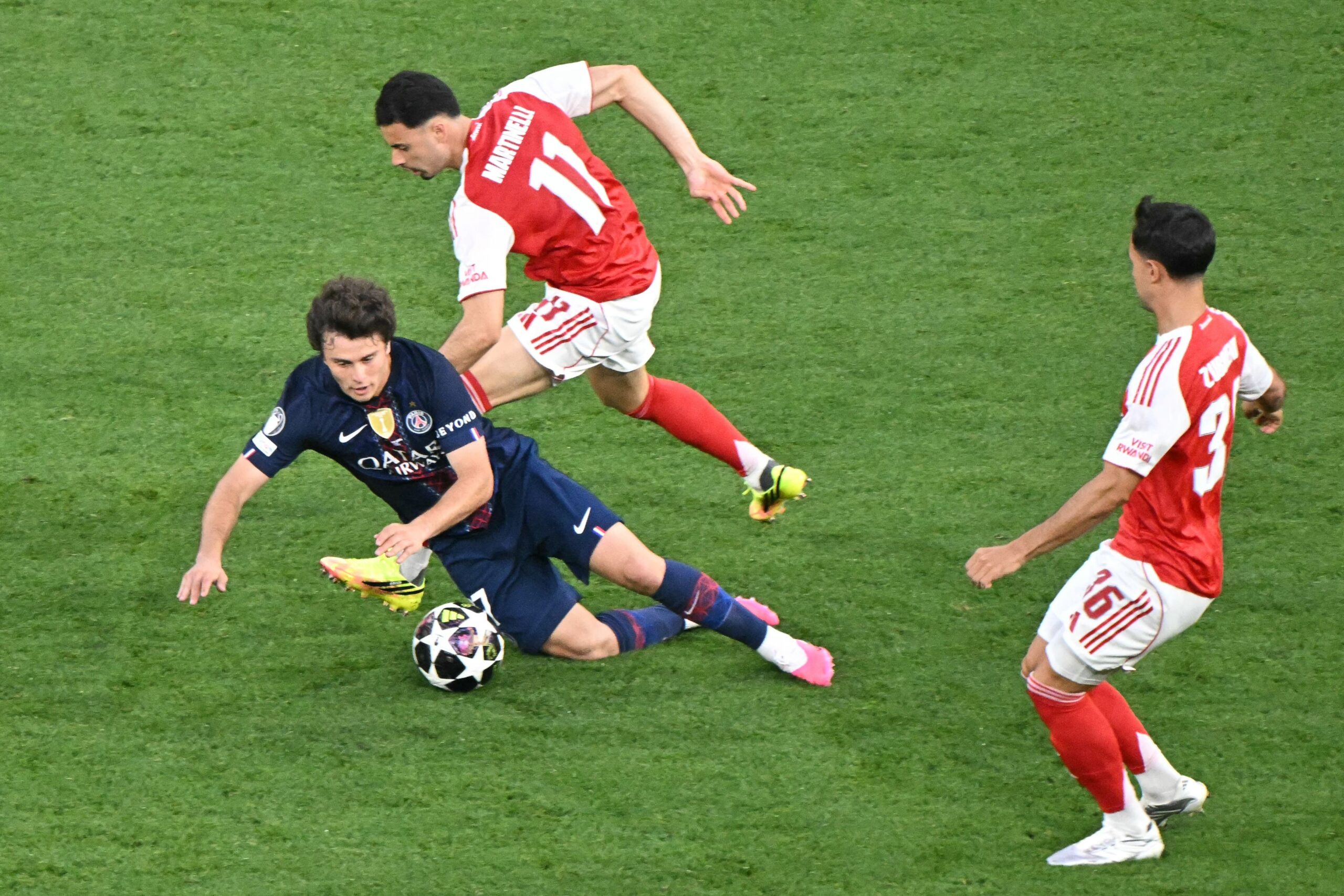 PSG and Arsenal compete for the ball during the 2026 Champions League final in Budapest