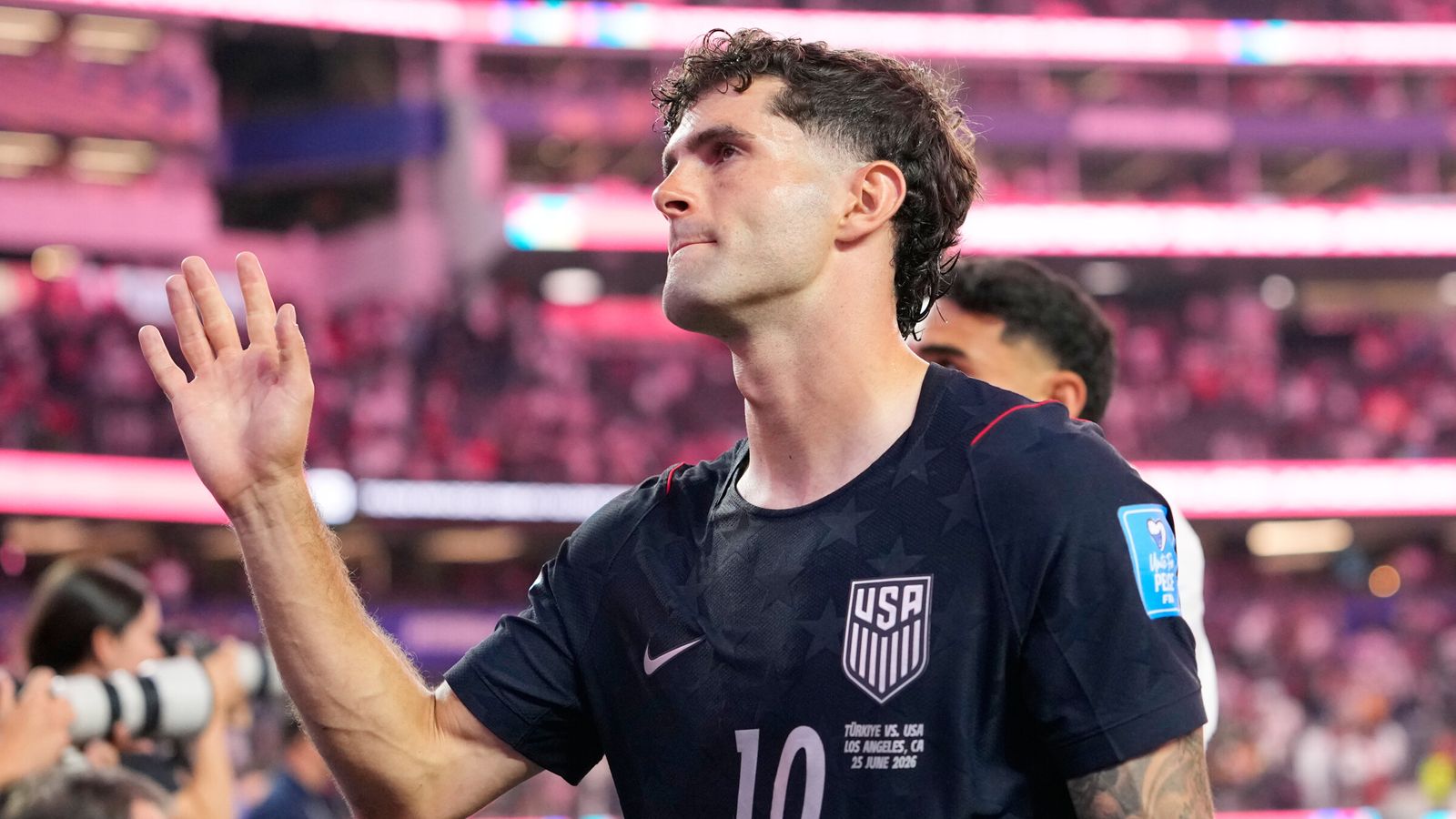 Christian Pulisic salutes the crowd after returning from injury in USA's 3-2 World Cup 2026 defeat to Türkiye in Los Angeles