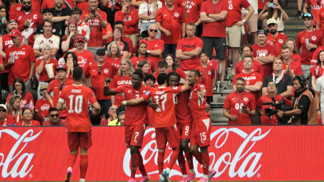 Soccer-Vargas, Manzambi strike as Switzerland top group with 2-1 victory over Canada