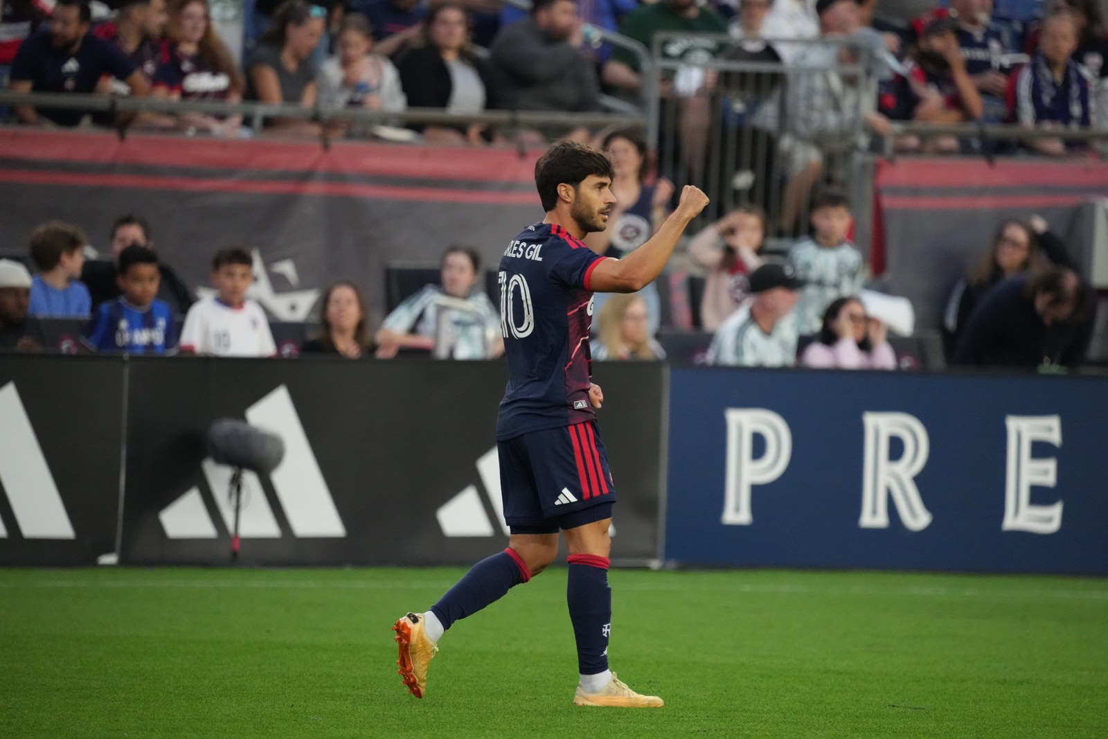 Carles Gil celebrates during New England Revolution's 4-1 win over Atlanta United at Gillette Stadium