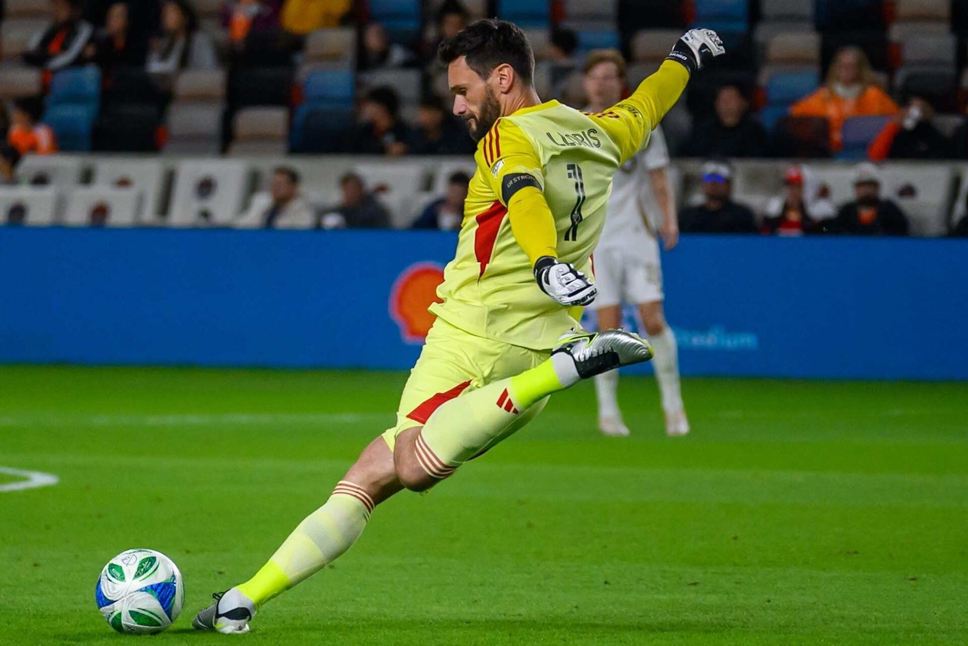 Los Angeles FC goalkeeper clears the ball during an MLS away match at Houston Dynamo