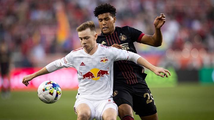 New York Red Bulls and Atlanta United players battle for the ball in an MLS Eastern Conference meeting