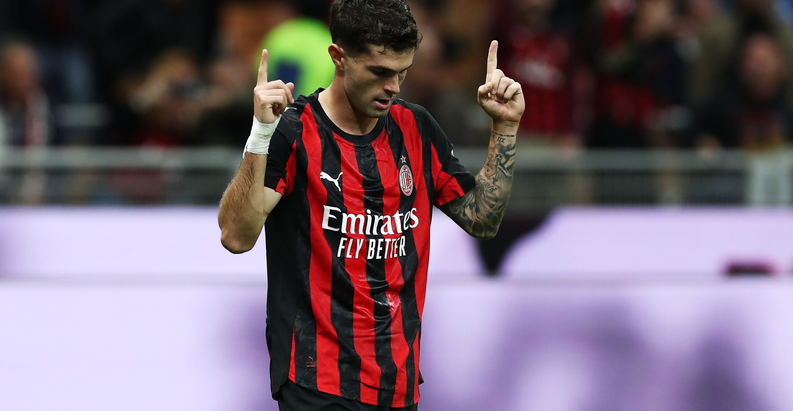 Christian Pulisic celebrates during AC Milan vs Torino