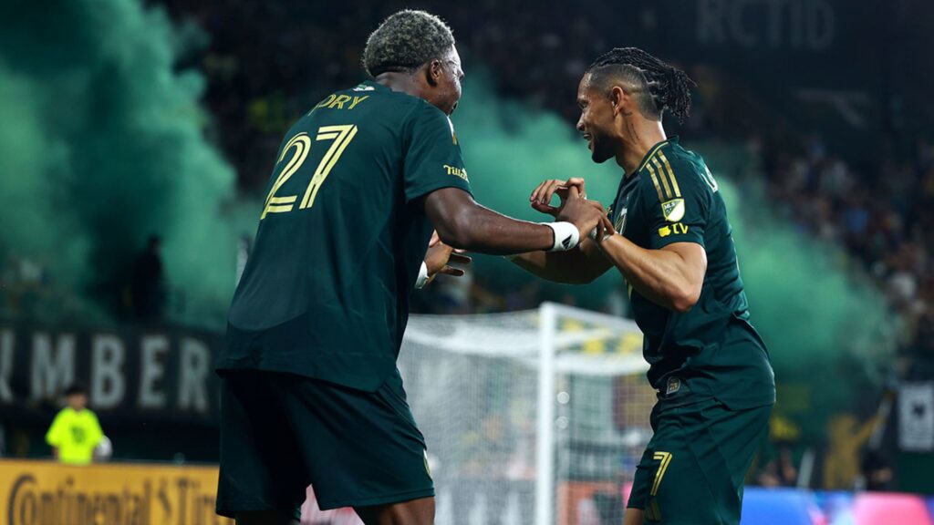 Ariel Lassiter celebrates with Jimer Fory after putting Portland Timbers 2-1 up against San Diego FC at Providence Park