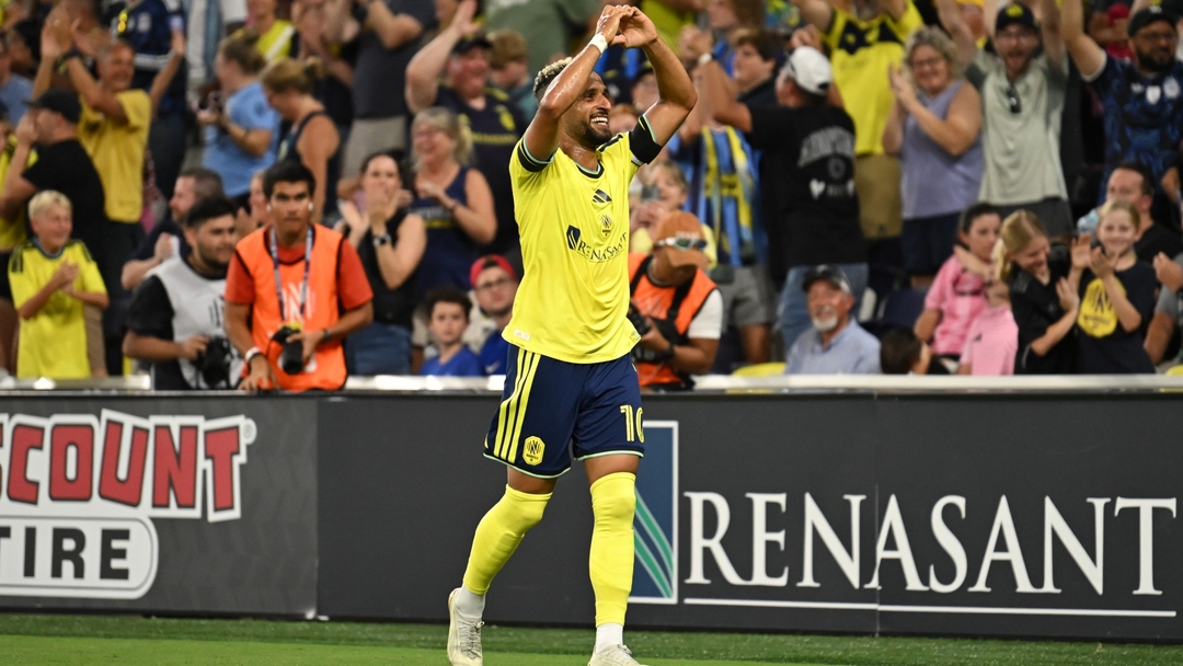 Nashville SC player celebrates in front of cheering home crowd
