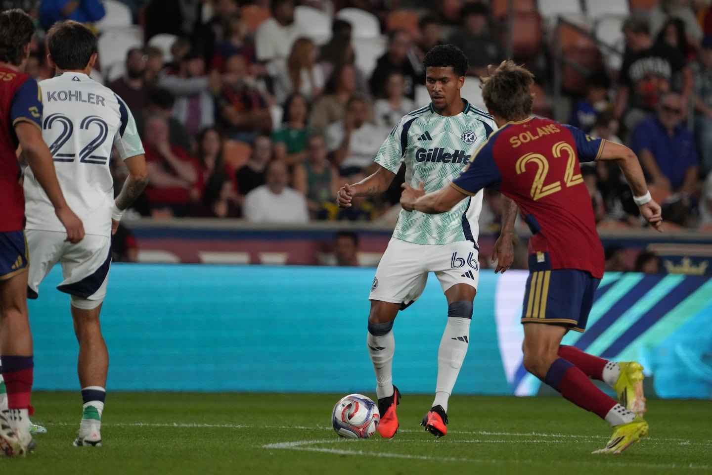 Real Salt Lake's Sergi Solans takes on the New England Revolution defense